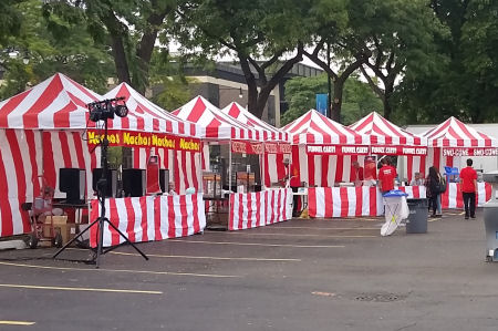 Carnival Food Stations At A Company Picnic